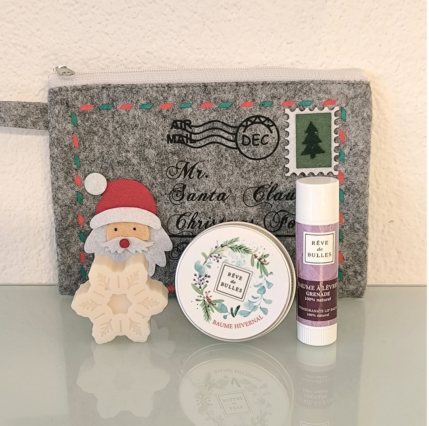 Pochette en tissu gris (stick, mini savon et baume hivernal)